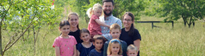 family posing for a portrait